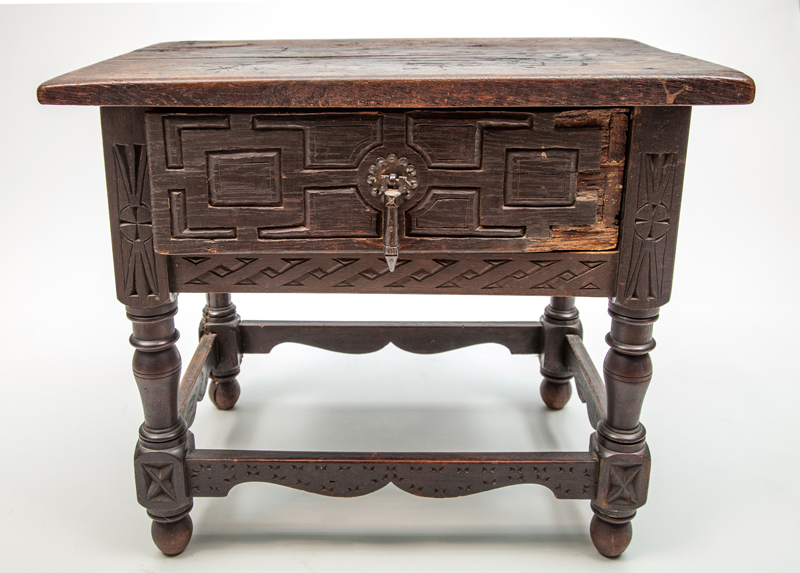 Appraisal: CONTINENTAL STAINED OAK SINGLE-DRAWER LOW TABLE x x in Collection