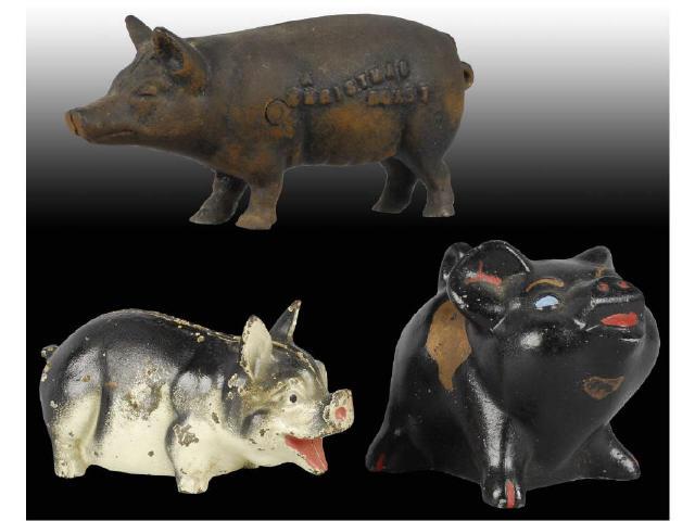 Appraisal: Lot of Cast Iron Pig Still Banks Description Pig L