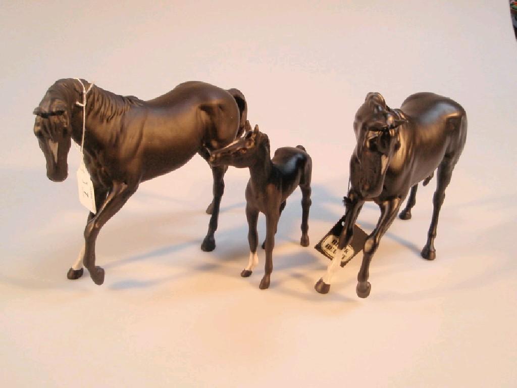 Appraisal: Beswick Black Beauty and foal and another Black Beauty and