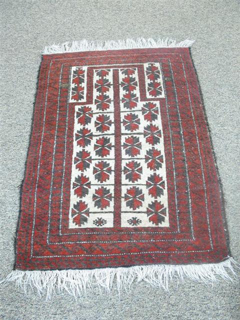 Appraisal: ORIENTAL RUG Red gray and cream tones - h w