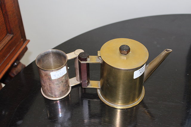 Appraisal: A TRENCH ART TEAPOT constructed from an old gunshell made