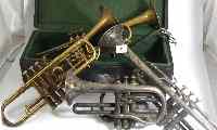 Appraisal: A collection of musical instruments comprising three trumpets and one