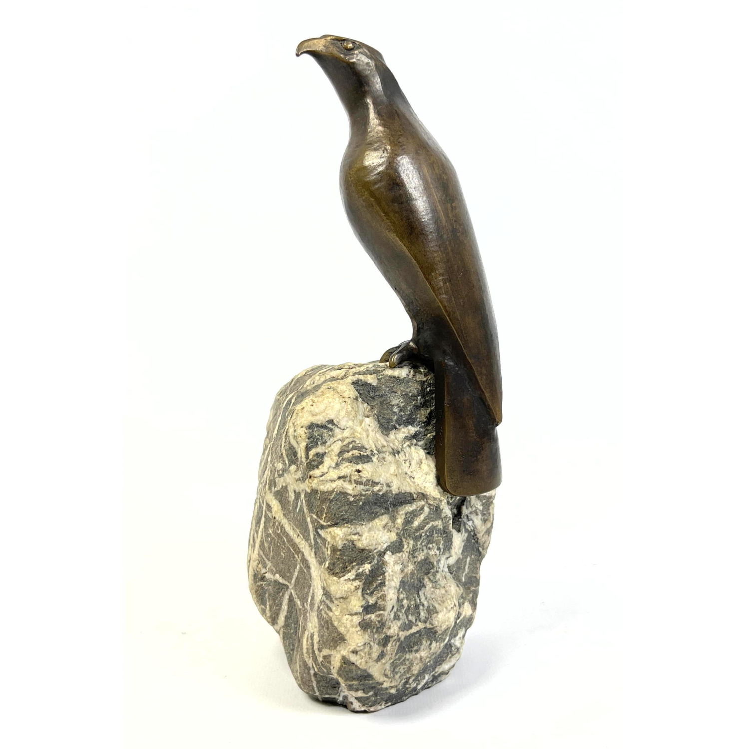 Appraisal: CHARLES REUSSNER Perched Falcon Bronze Sculpture on Stone Base Dimensions