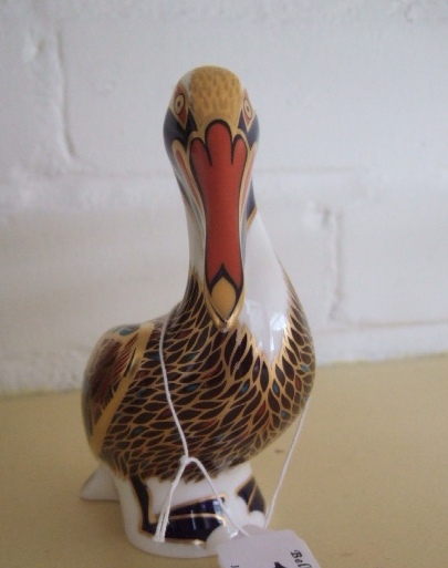 Appraisal: A Royal Crown Derby paperweight 'Brown Pelican' decorated in an