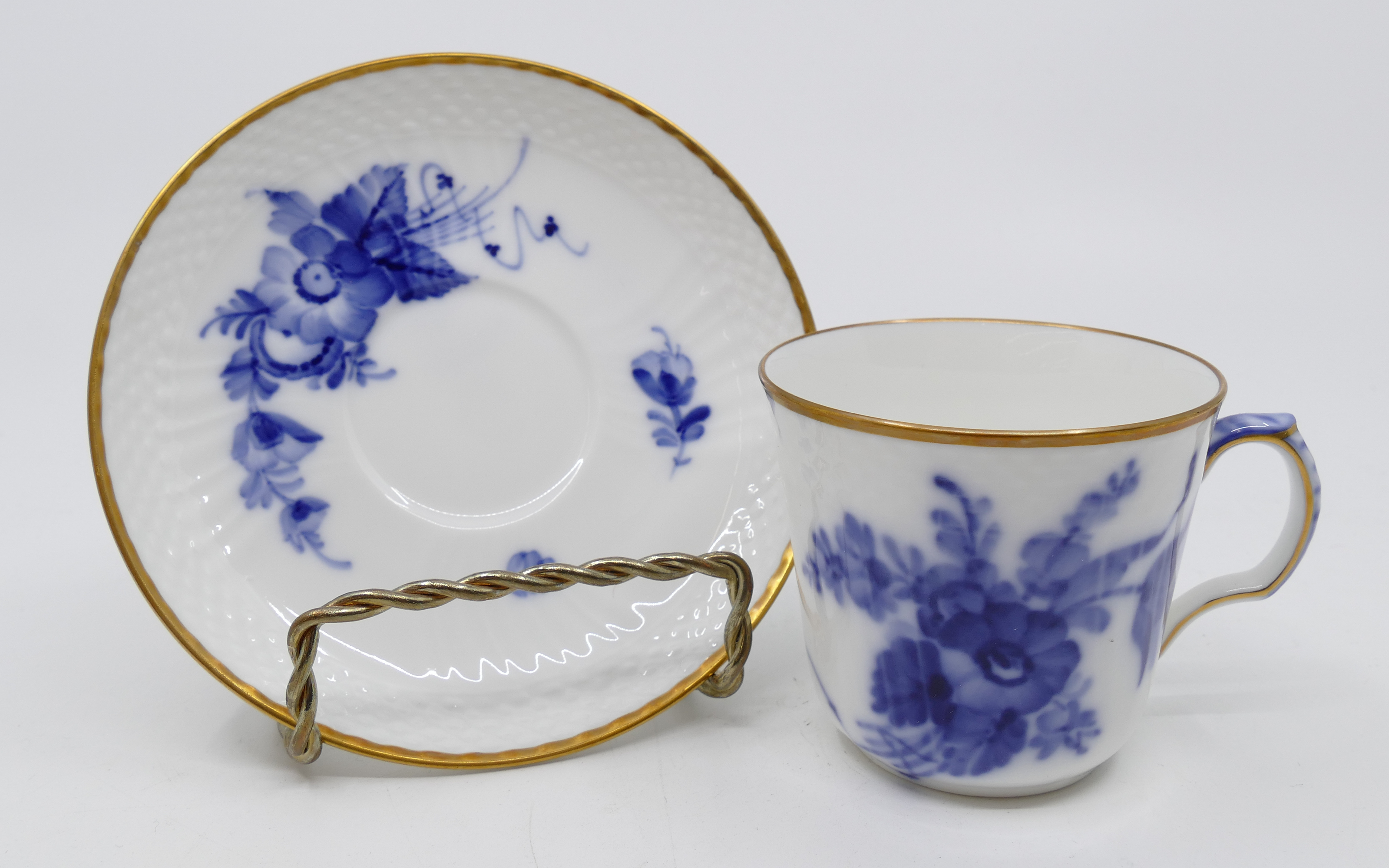 Appraisal: pc Royal Copenhagen Blue Flowers Curved Flat Demitasse Cups Saucers