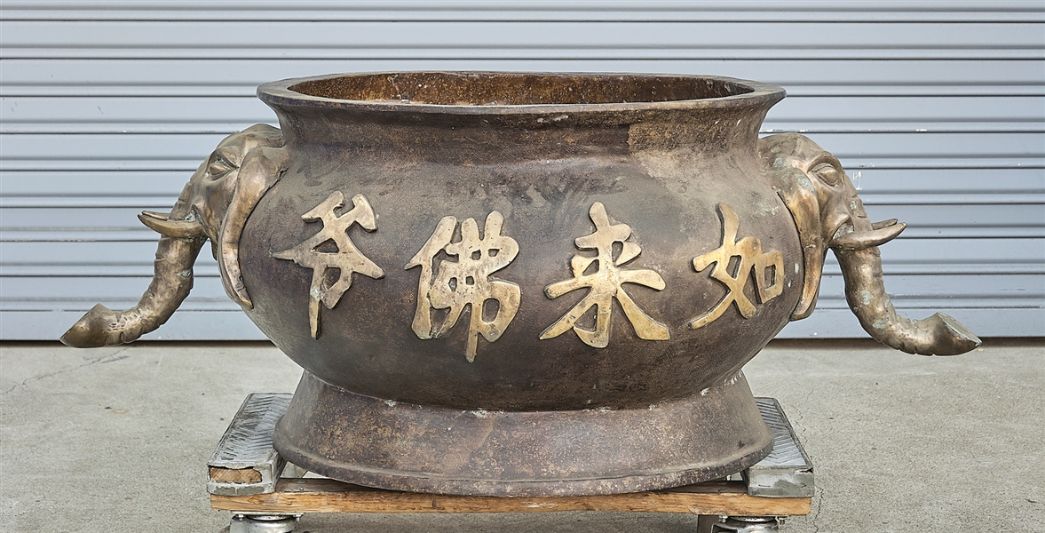 Appraisal: Chinese bronze censer with elephant head ears calligraphy x x