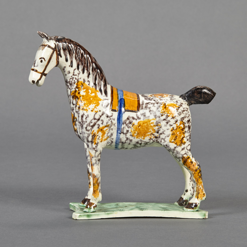 Appraisal: Pearlware Pottery Figure of a Horse Circa The standing figure