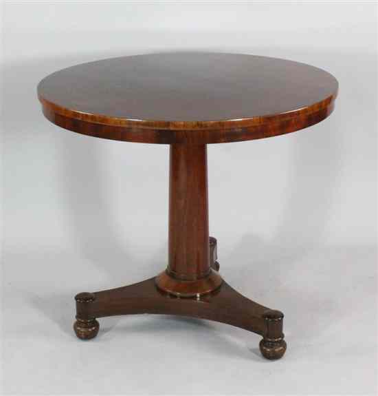 Appraisal: An early Victorian mahogany circular occasional table with platform on