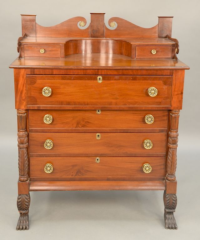 Appraisal: Mahogany Sheraton chest with backsplash carved columns and paw feet