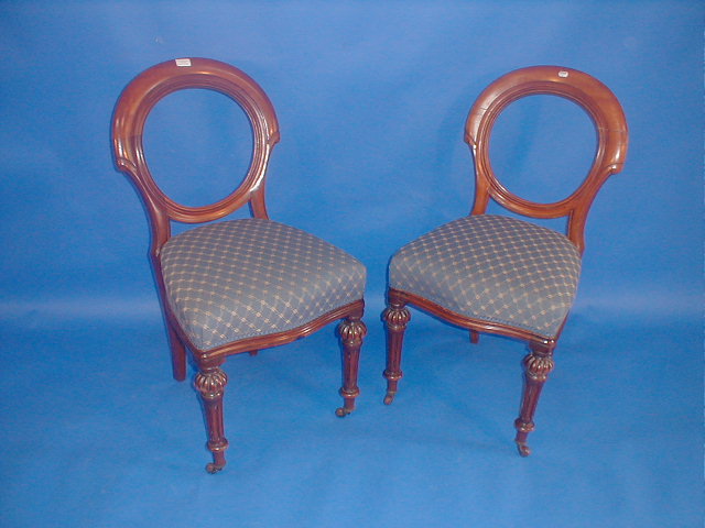 Appraisal: A set of eight thC Irish mahogany dining chairs with