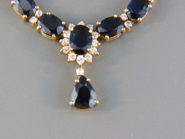 Appraisal: Sapphire Necklace deep blue oval and pear shape gems totaling