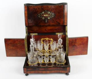 Appraisal: French Napoleon III tantalus set in burled elm box with