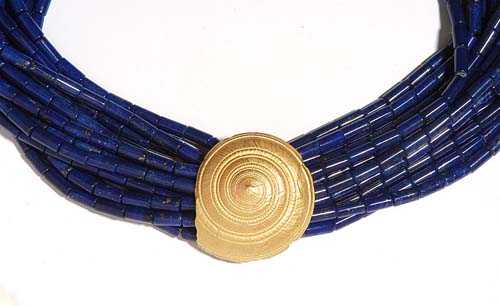 Appraisal: LAPIS-LAZULI NECKLACE Yellow gold Casual-elegant -row necklace of lapis-lazuli cylinders