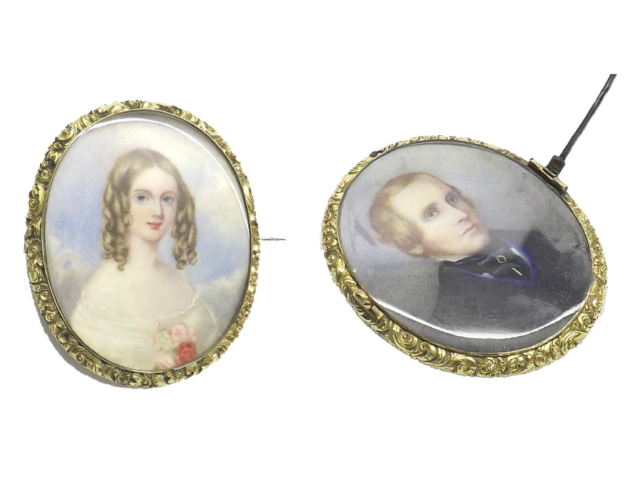 Appraisal: th century double-sided miniature brooch inset with painted portraits of