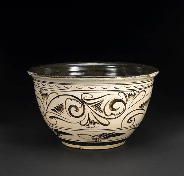 Appraisal: A Cizhou brown and ivory slip-glazed stoneware deep bowl Ming