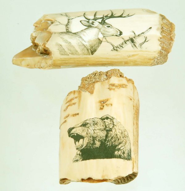 Appraisal: Two modern wildlife scrimshaw carvings on fossilized bone One of