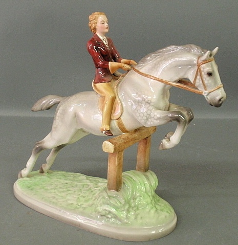 Appraisal: - Large porcelain equine statue of a woman on a