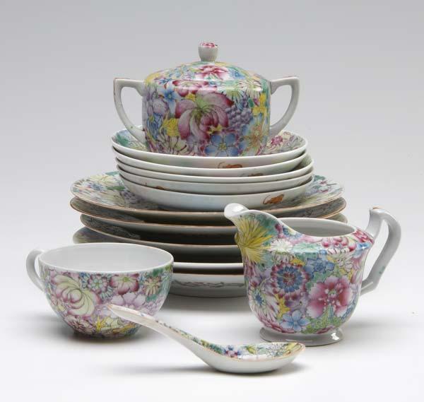 Appraisal: CHINESE PORCELAIN PARTIAL TEA SET Thirty-seven pieces with floral decoration