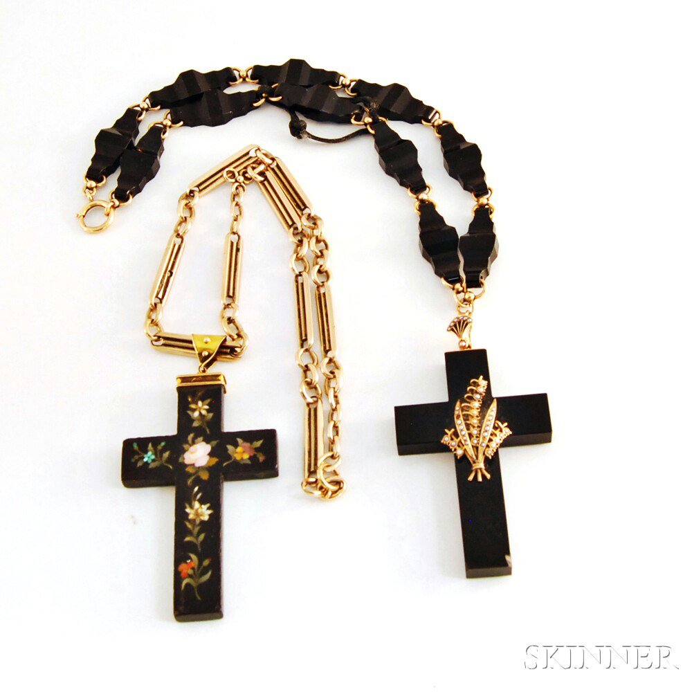 Appraisal: Two Black Crosses a stone cross with inlaid stones in