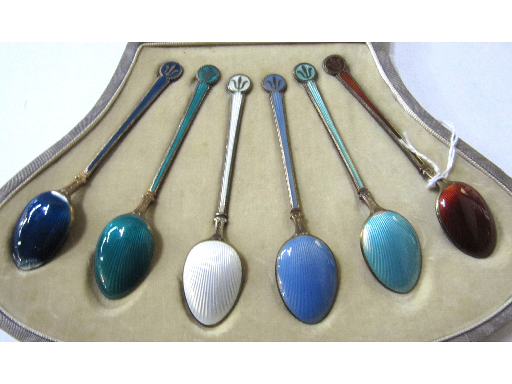 Appraisal: A cased set of six continental silver gilt and enamel