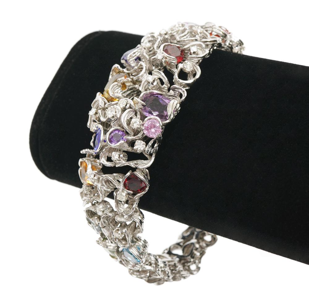 Appraisal: Modernist K white gold diamond multistone bracelet features a free