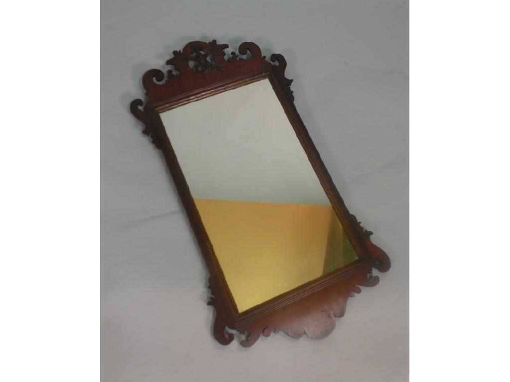 Appraisal: An thC walnut fret frame mirror the pierced crest with