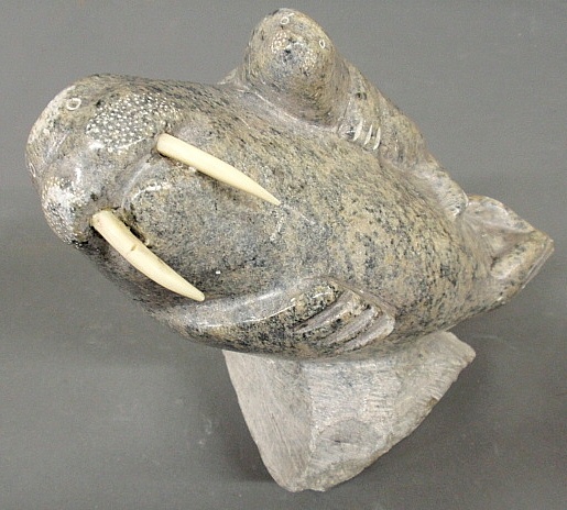 Appraisal: - Inuit carved hard stone figural group titled Walrus Pup