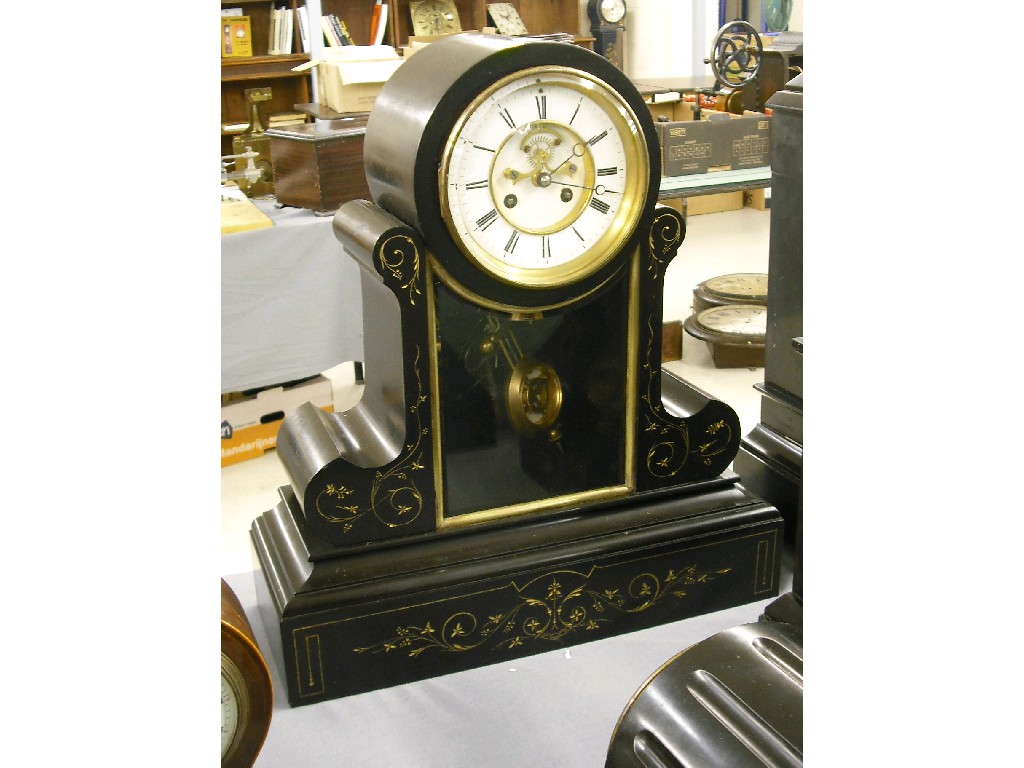 Appraisal: Large black slate two train drumhead mantel clock the movement