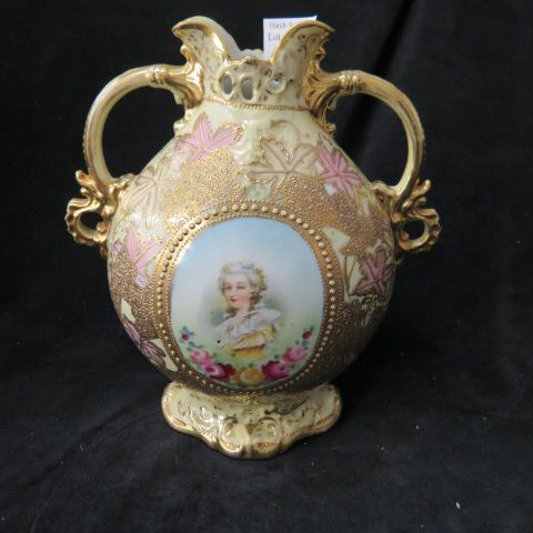 Appraisal: Nippon Porcelain Portrait Vase handpainted handled elaborate gold work unsigned