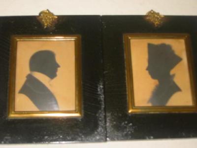 Appraisal: ENGLISH SCHOOL Silhouette Portraits of a Lady and a Gentleman