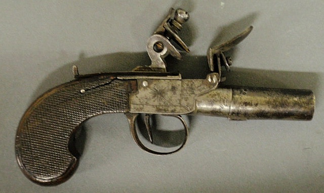 Appraisal: Small Continental flintlock pistol th c with a check carved