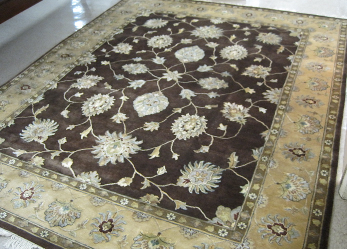 Appraisal: HAND KNOTTED ORIENTAL WOOL AND SILK CARPET Indo-Persian overall floral