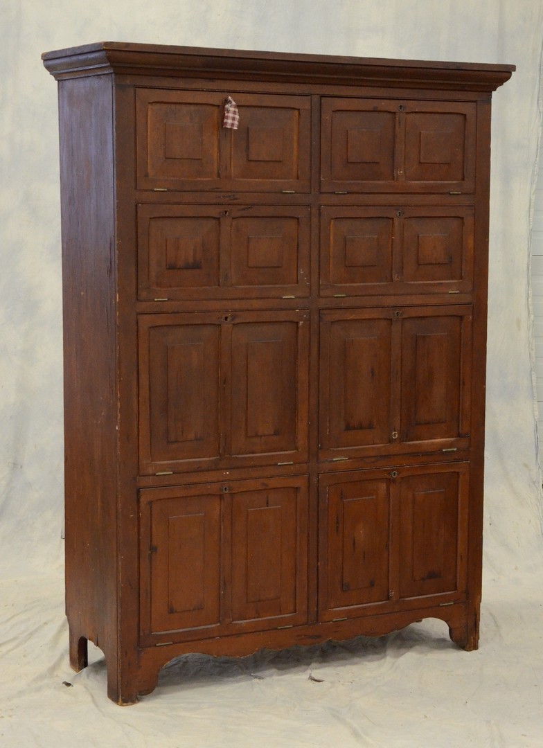 Appraisal: Pine linen cupboard with small and large fall front compartments