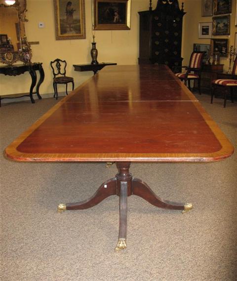 Appraisal: REGENCY STYLE MAHOGANY FOUR PEDESTAL DINING TABLE th century the