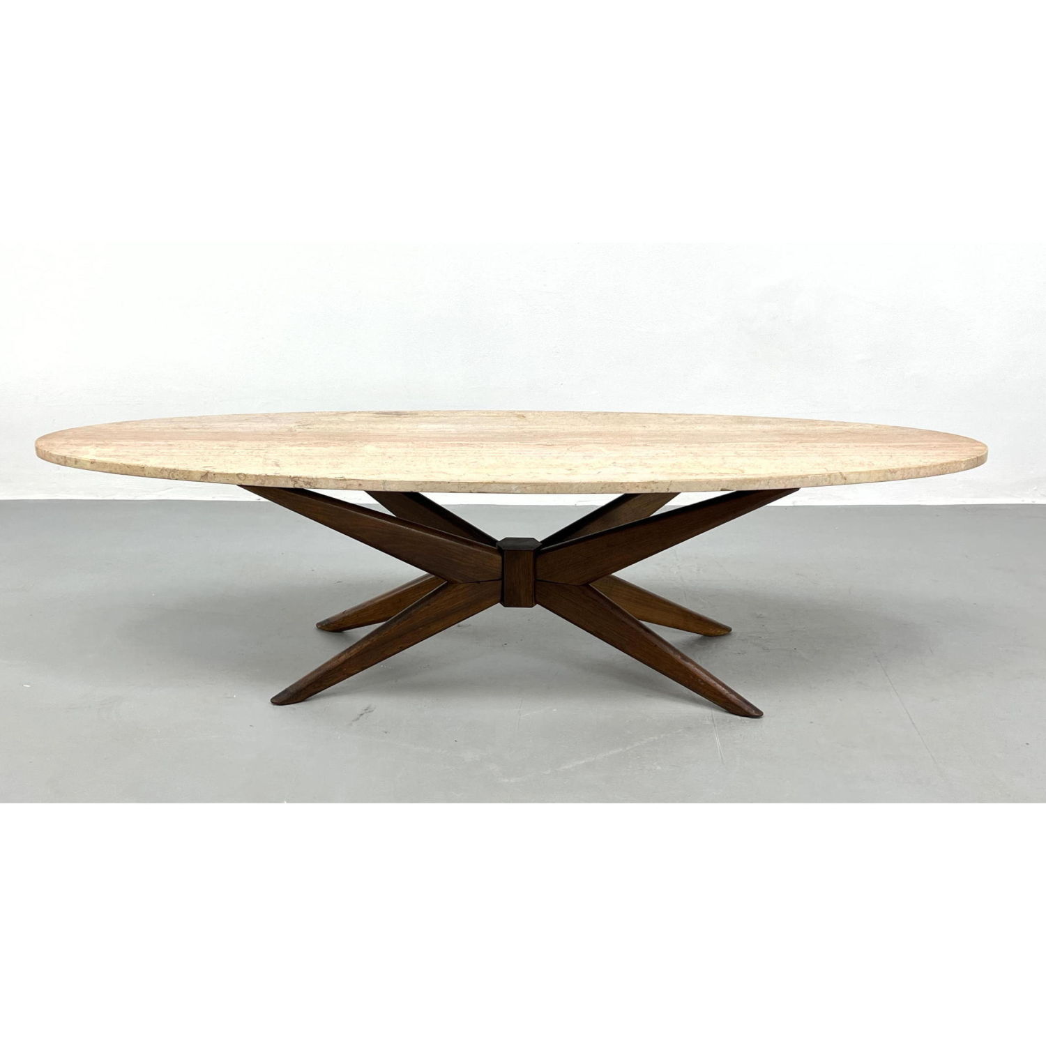 Appraisal: Travertine Oval Top Modernist Cocktail Table Italian Style Corseted sputnik