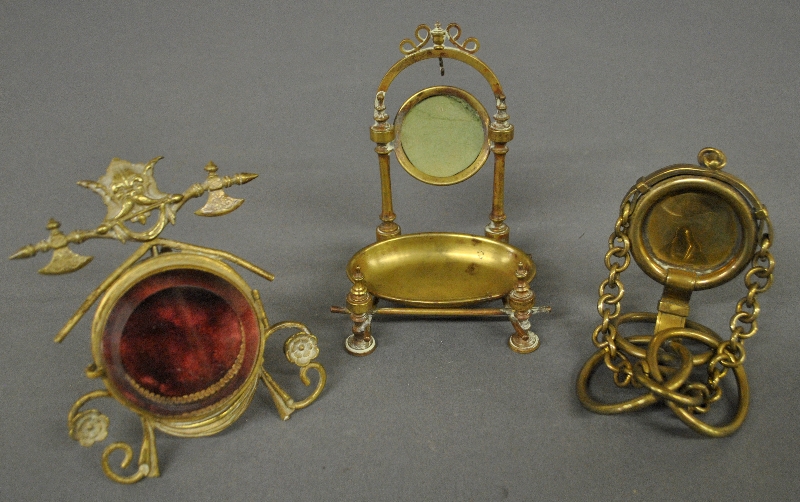 Appraisal: - Three brass watch holders th c including one with