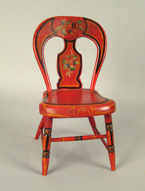 Appraisal: Pennsylvania miniature painted balloonback chair th c retaining and vibrant