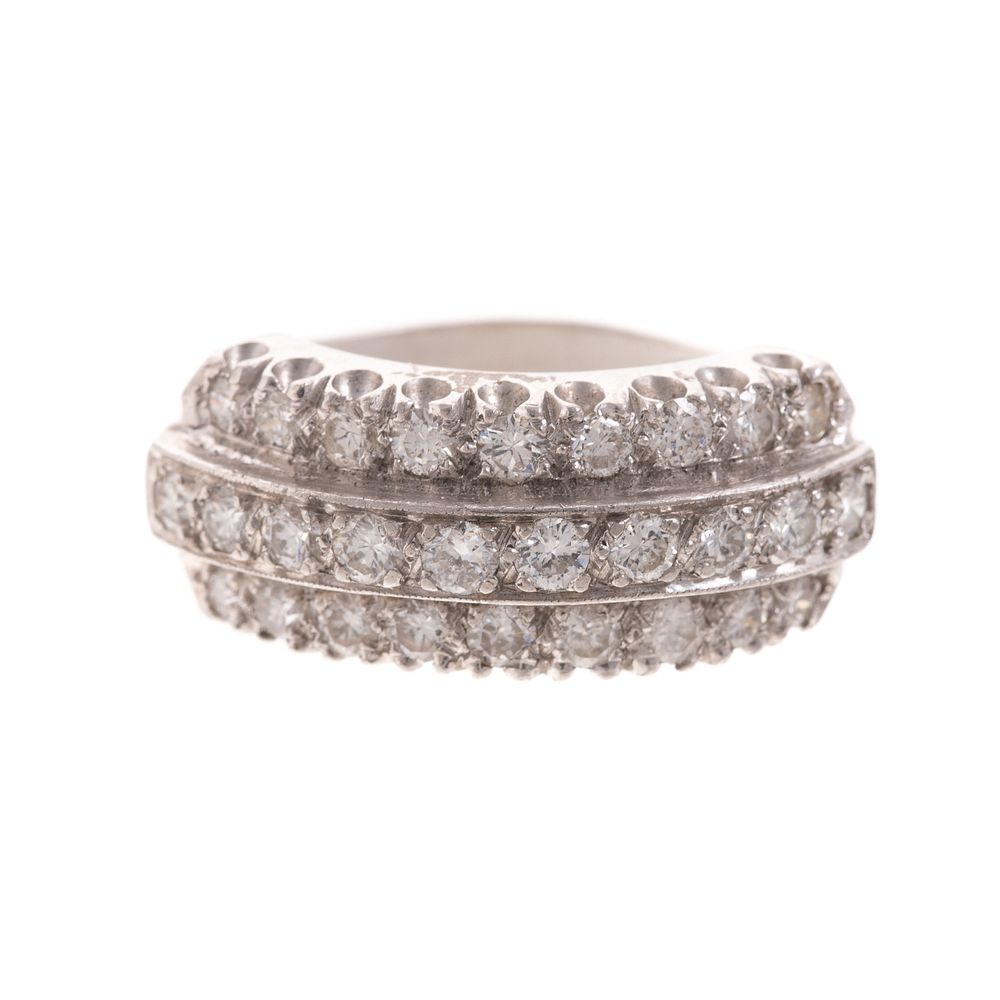 Appraisal: A Three-Row Diamond Band in Platinum Platinum band features three