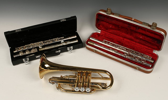 Appraisal: AN EARLHAM CORNET in carrying case a Noblet Paris flute