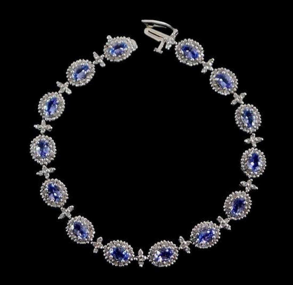 Appraisal: JEWELRY K Tanzanite and Diamond Bracelet halo style set bracelet