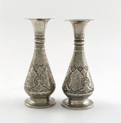 Appraisal: A pair of Persian vases baluster with engraved panels chased