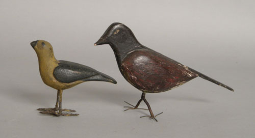 Appraisal: Two carved and painted bird figures ca h and h