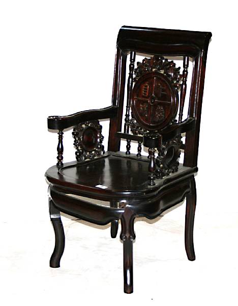 Appraisal: Two Chinese export hardwood armchair Each with an inscribed coin