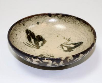 Appraisal: Attributed to Charles Vyse British - a stoneware terracotta bowl