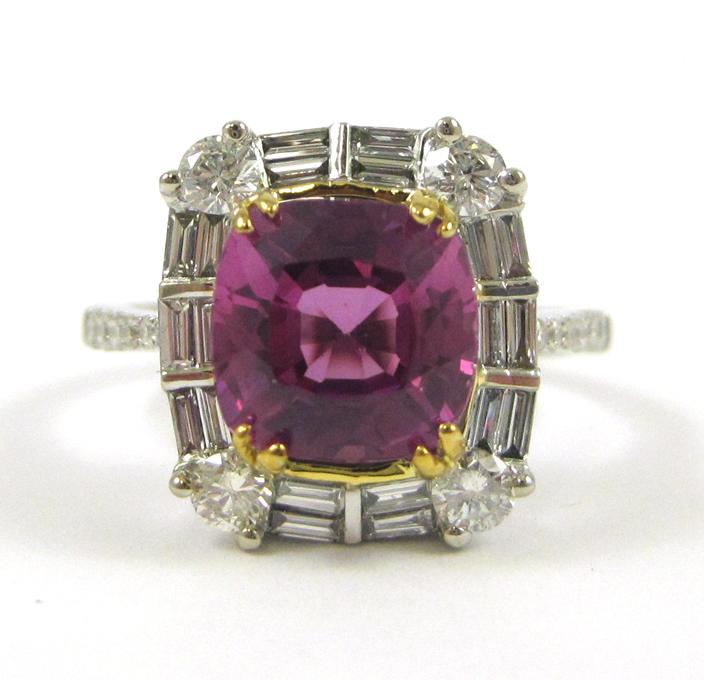 Appraisal: PINK SAPPHIRE DIAMOND AND FOURTEEN KARAT GOLD RING The white