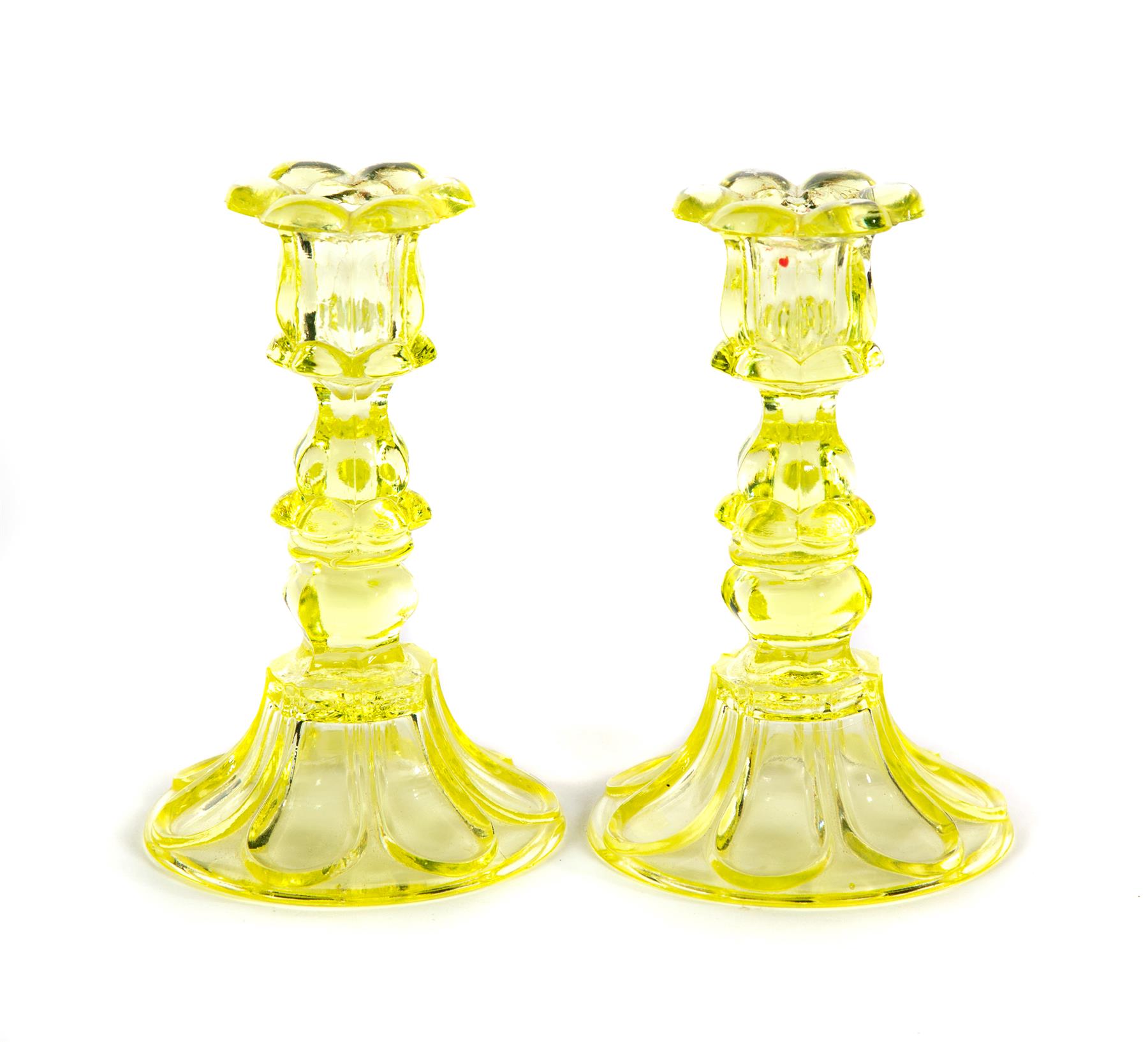 Appraisal: PAIR OF SANDWICH GLASS CANDLESTICKS Mid th century Canary with