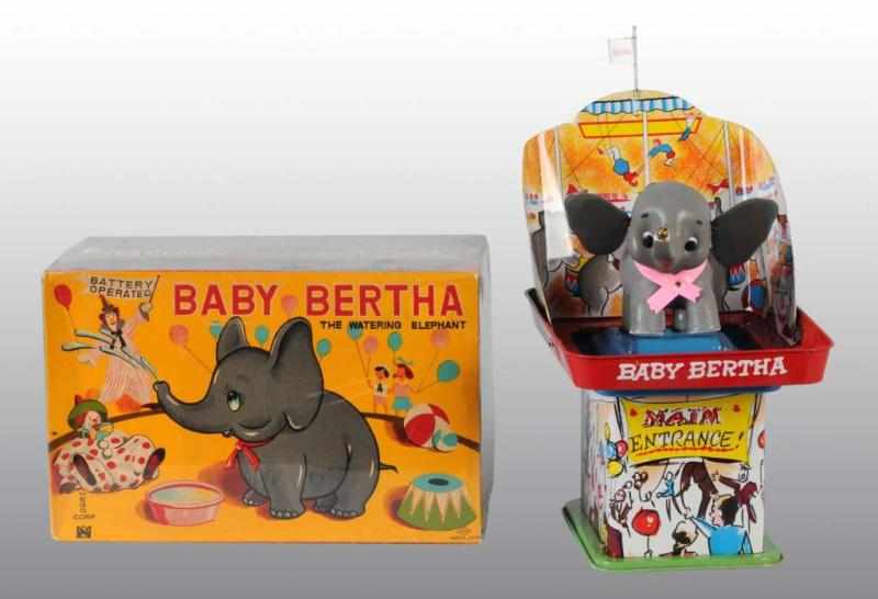 Appraisal: Tin Baby Bertha Watering Elephant Battery-Op Toy Description Japanese Working