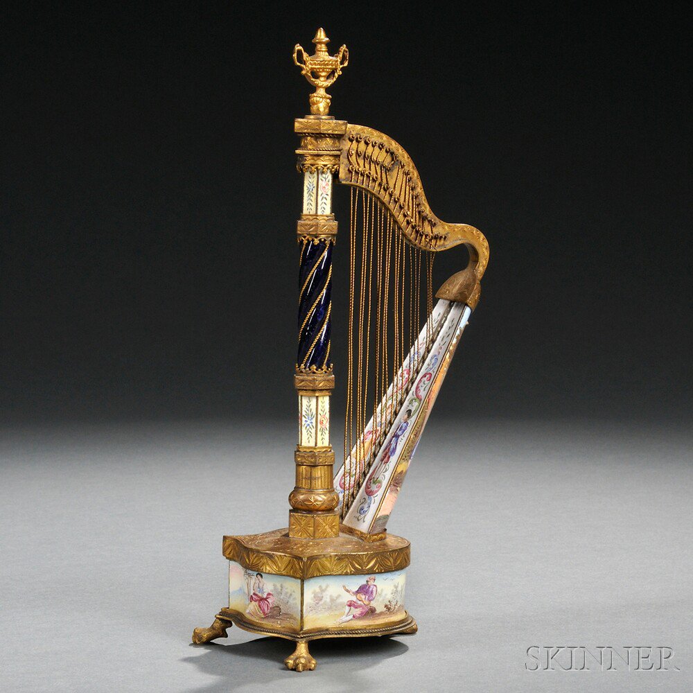 Appraisal: Viennese Gilt-metal and Enamel Harp-form Clock Austria late th century