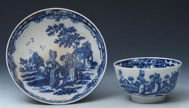 Appraisal: A WORCESTER TEA BOWL and saucer decorated in the milk