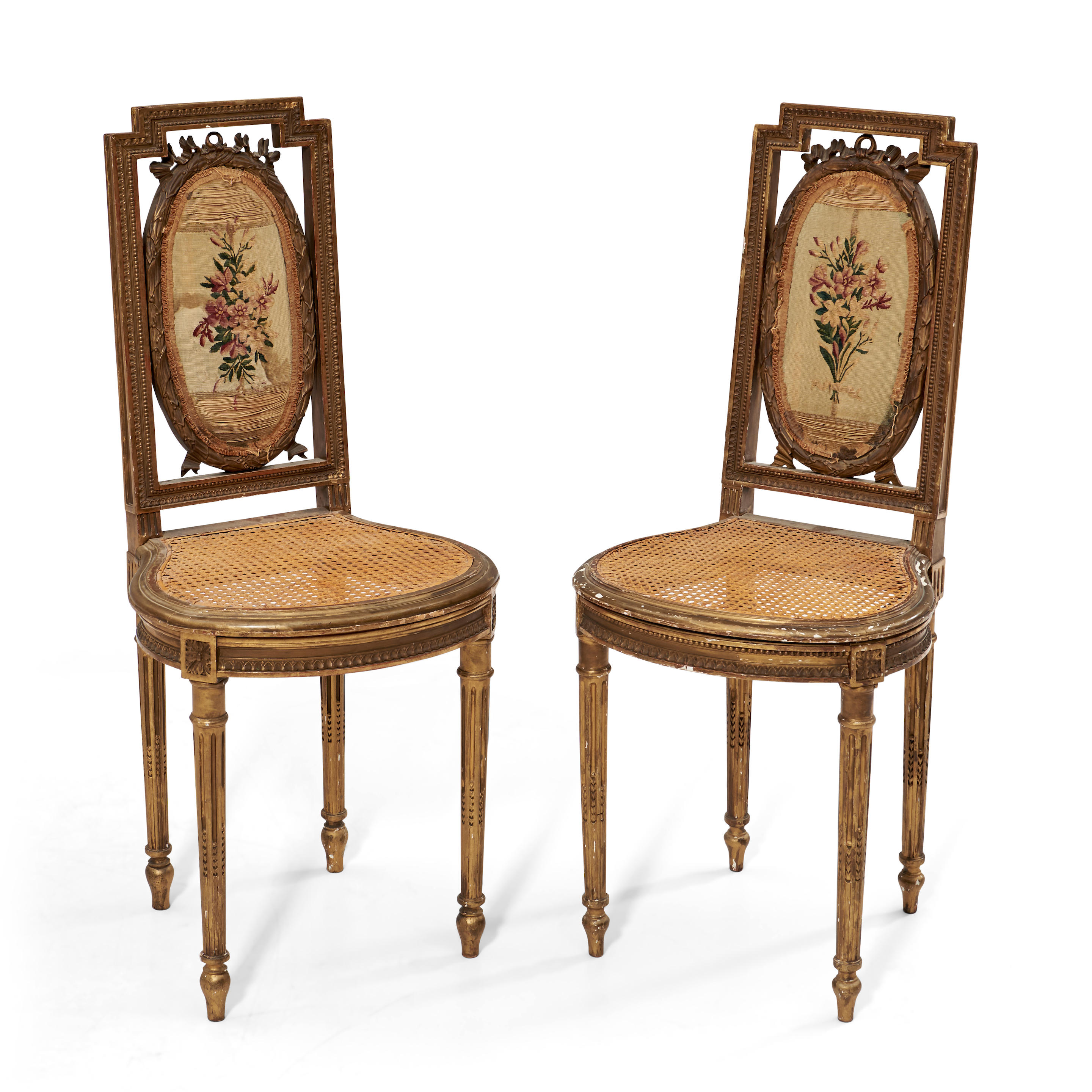 Appraisal: PAIR OF LOUIS XVI-STYLE GILT-WOOD SIDE CHAIRS with floral-decorated needlework